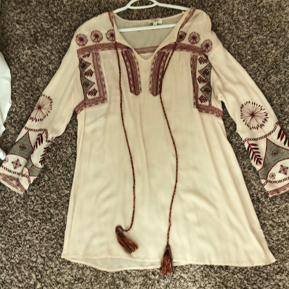 Cream dress with detailing